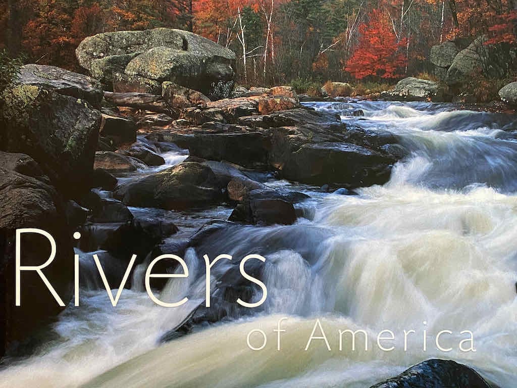 Front cover of a book containing a map of rivers
